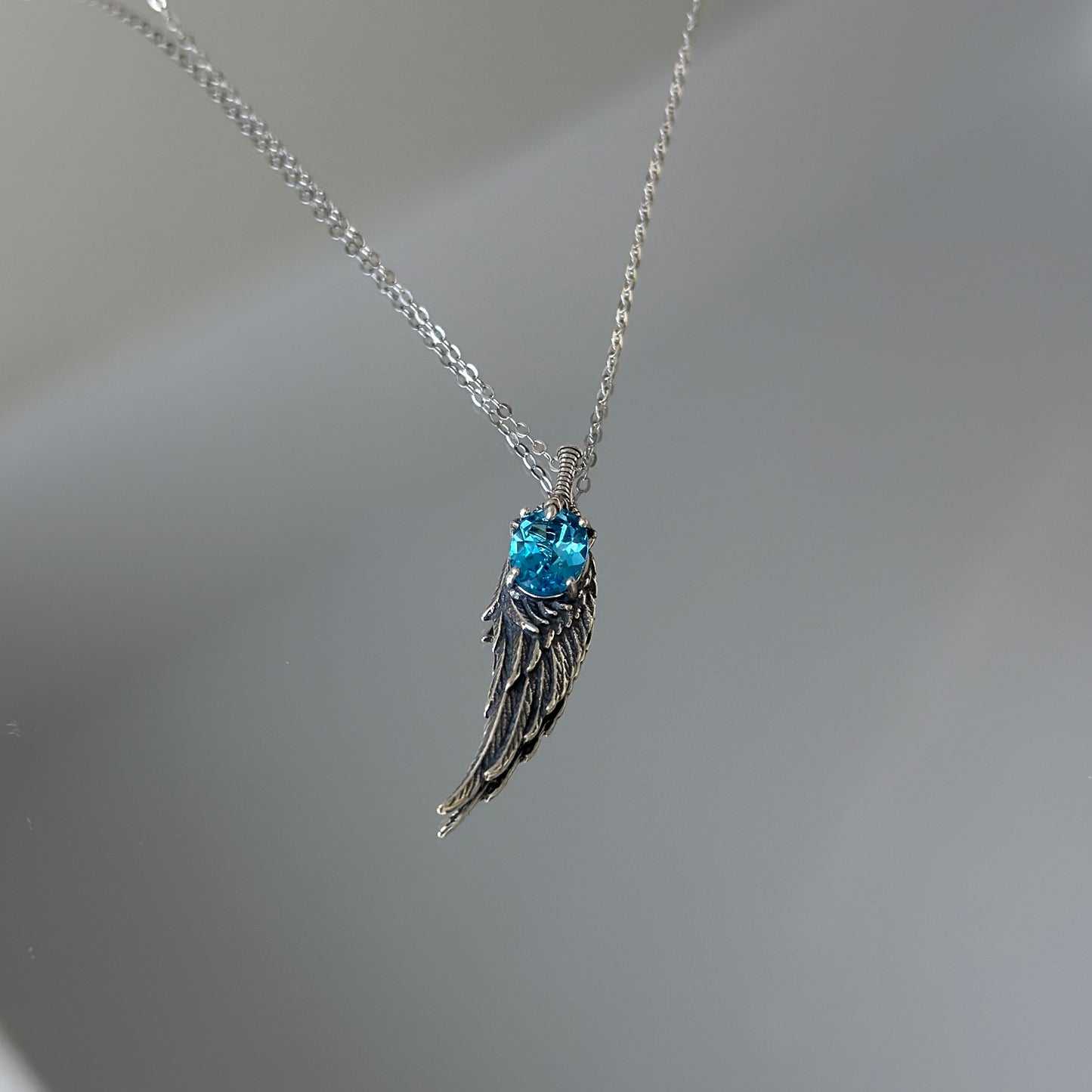 The Wing of Sky: Natural Blue Topaz Silver Necklace