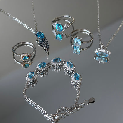 The Eye of Ocean: Natural Blue Topaz Silver Necklace