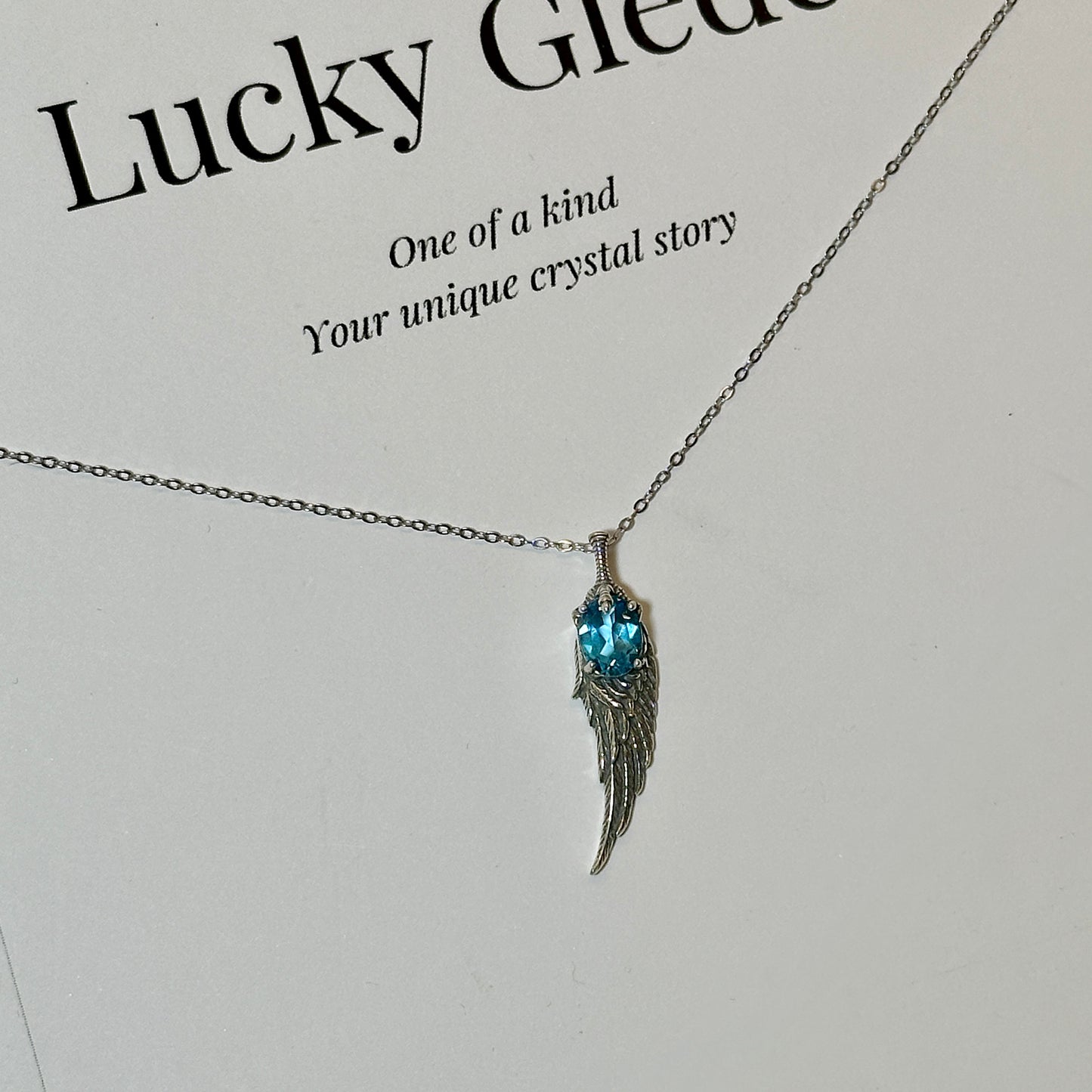 The Wing of Sky: Natural Blue Topaz Silver Necklace